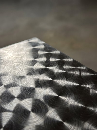 Brushed Steel — One hard key, every swirl taking its own crescent.